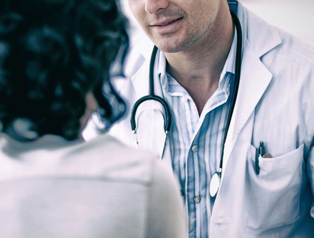 Doctor talking to patient