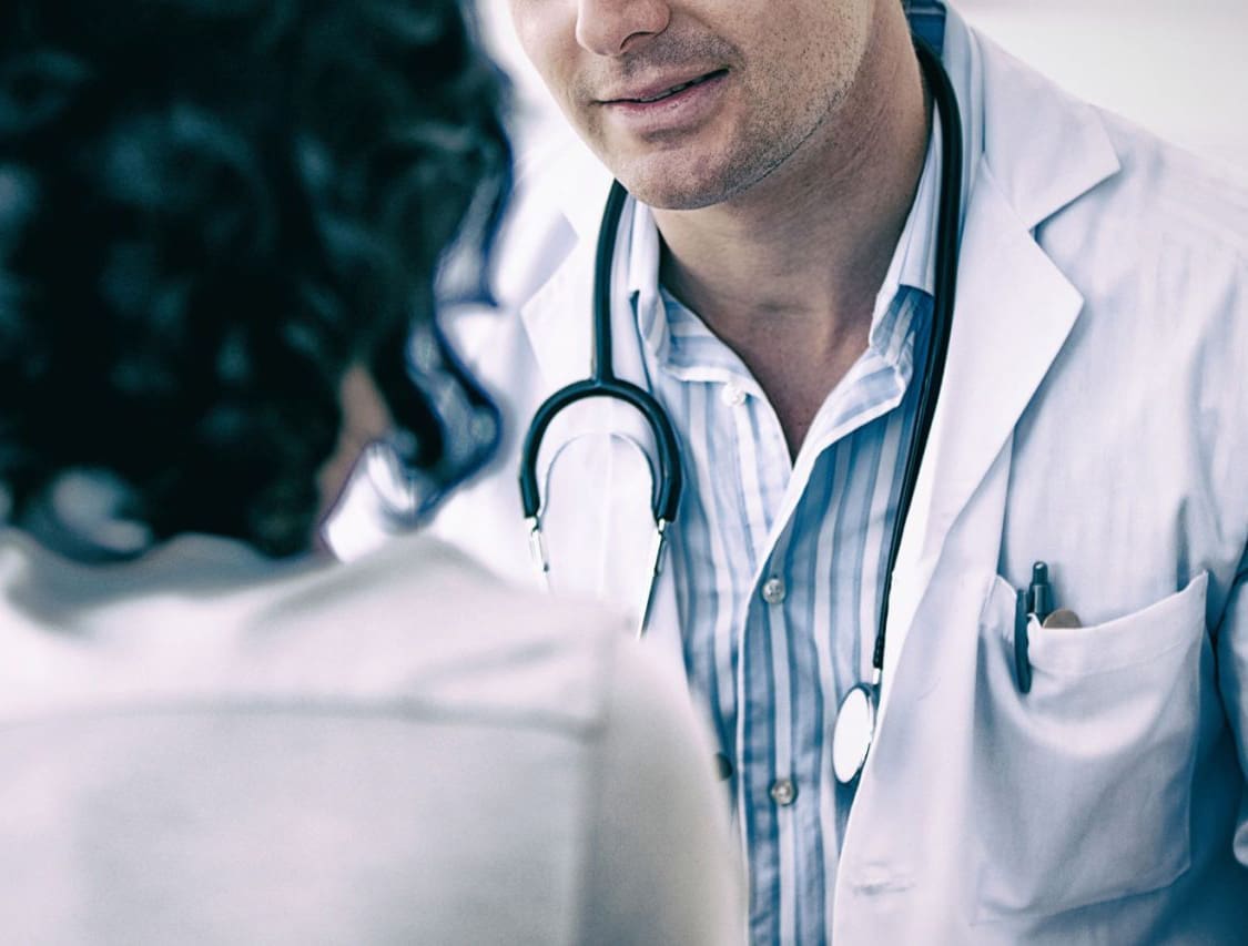 Doctor talking to patient